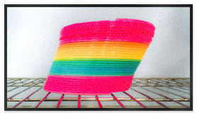 A slinky coincidentally in pansexual pride colors kind of